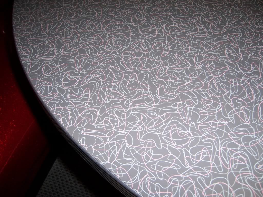 Closeup Of Gray Boomerang Formica Table Top Photo by Ronni100